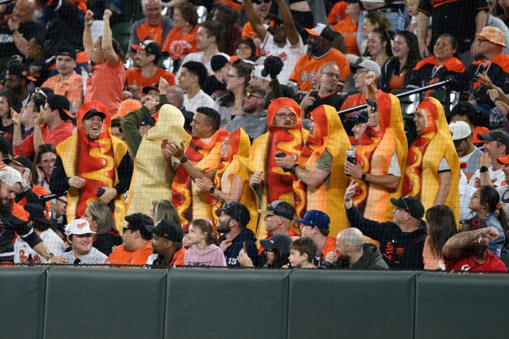 Apr 18, 2025; Baltimore, Maryland, USA; Baltimore Orioles fans react during the seventh inning between the Baltimore Orioles and Cincinnati Reds at Oriole Park at Camden Yards. Mandatory Credit: Reggie Hildred-Imagn Images