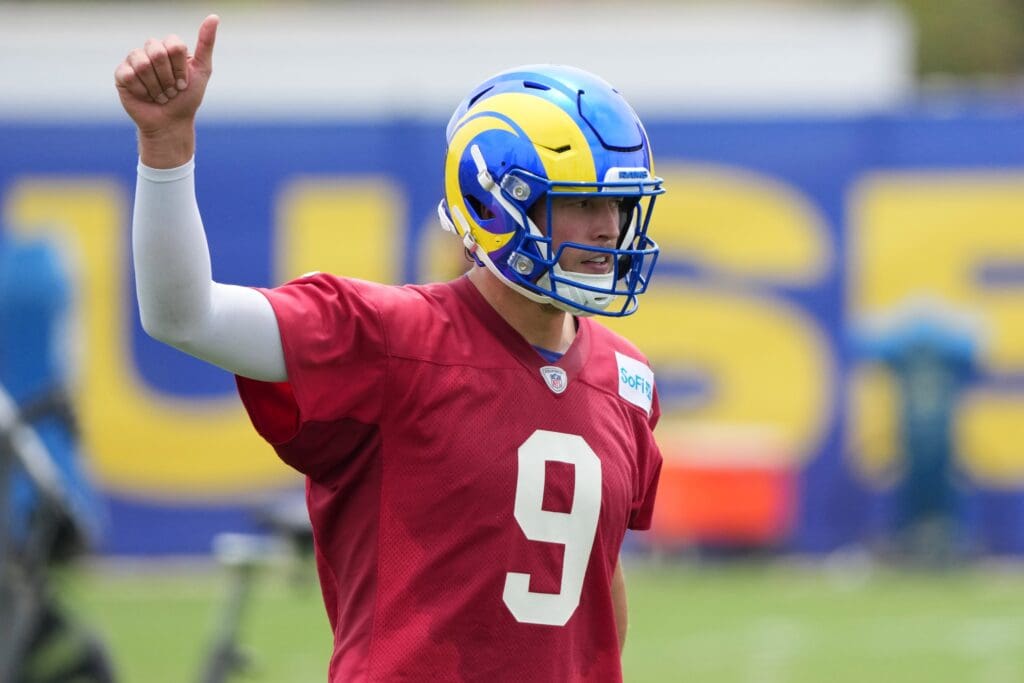 May 28, 2025; Woodland Hills, CA, USA; Los Angeles Rams quarterback Matthew Stafford (9) gestures during organized team activities at Rams Practice Facility. Mandatory Credit: May 28, 2025; Woodland Hills, CA, USA; Los Angeles Rams quarterback Matthew Stafford (9) gestures during organized team activities at Rams Practice Facility. Mandatory Credit: Kirby Lee-Imagn Images
