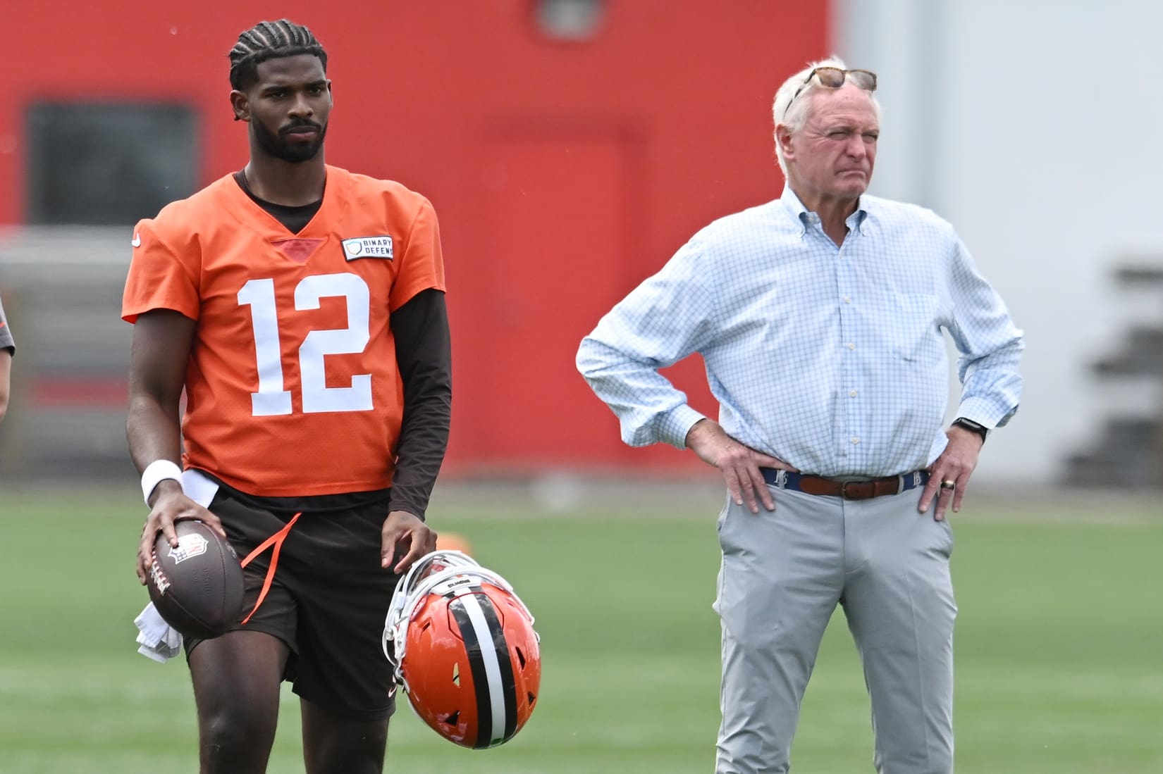Jun 10, 2025; Berea, OH, USA; Cleveland Browns quarterback Shedeur Sanders (12) and managing and principal partner Jimmy Haslam watch a play during minicamp at CrossCountry Mortgage Campus. Mandatory Credit: Ken Blaze-Imagn Images