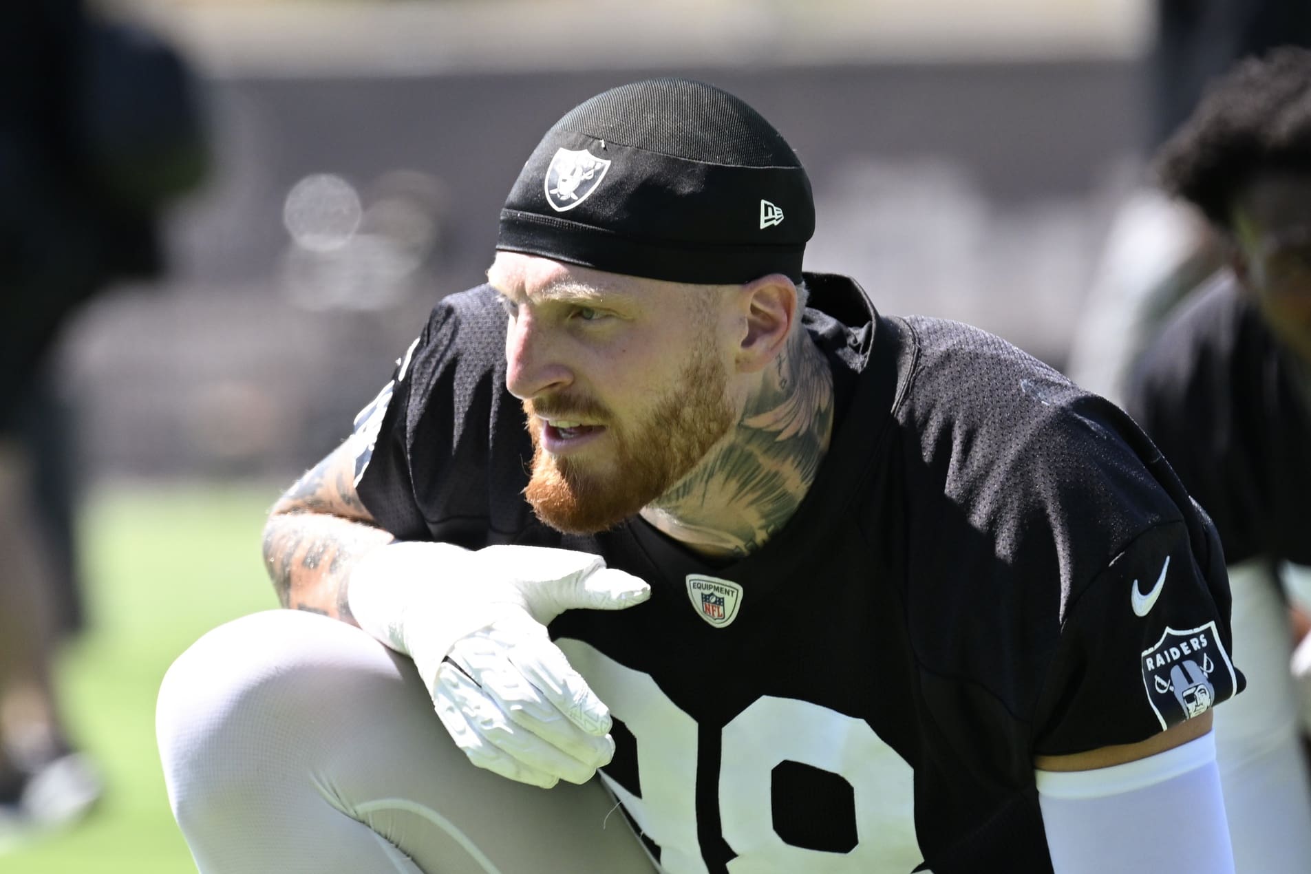 Jun 10, 2025; Henderson, NV, USA; Las Vegas Raiders defensive end Maxx Crosby (98) looks on during the team stretch during Las Vegas Raiders Minicamp at Intermountain Health Performance Center. Mandatory Credit: Candice Ward-Imagn Images