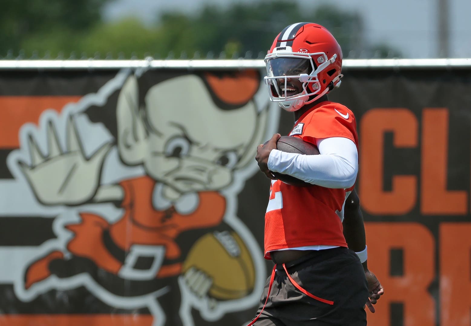 Browns quarterback Shedeur Sanders celebrates after breaking away for a big gain during practice, Wednesday, June 11, 2025, in Berea.