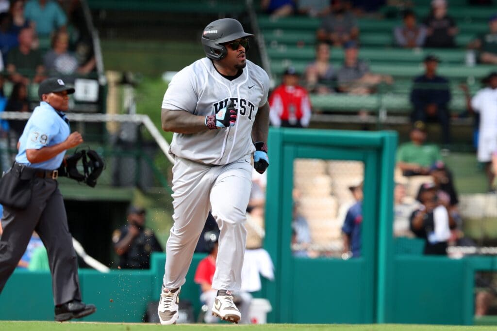 Jun 19, 2025; Birmingham, AL, USA; West team first baseman Prince Fielder (28) jogs to first base during the East-West Classic at Rickwood Field. Mandatory Credit: David Leong-Imagn Images