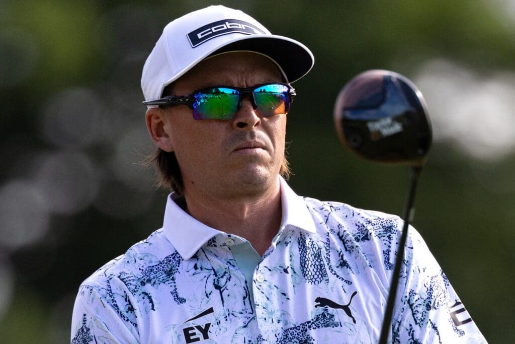 Jun 20, 2025; Cromwell, Connecticut, USA; Rickie Fowler prepares to play his shot from the first tee during the second round of the Travelers Championship golf tournament. Mandatory Credit: Bill Streicher-Imagn Images