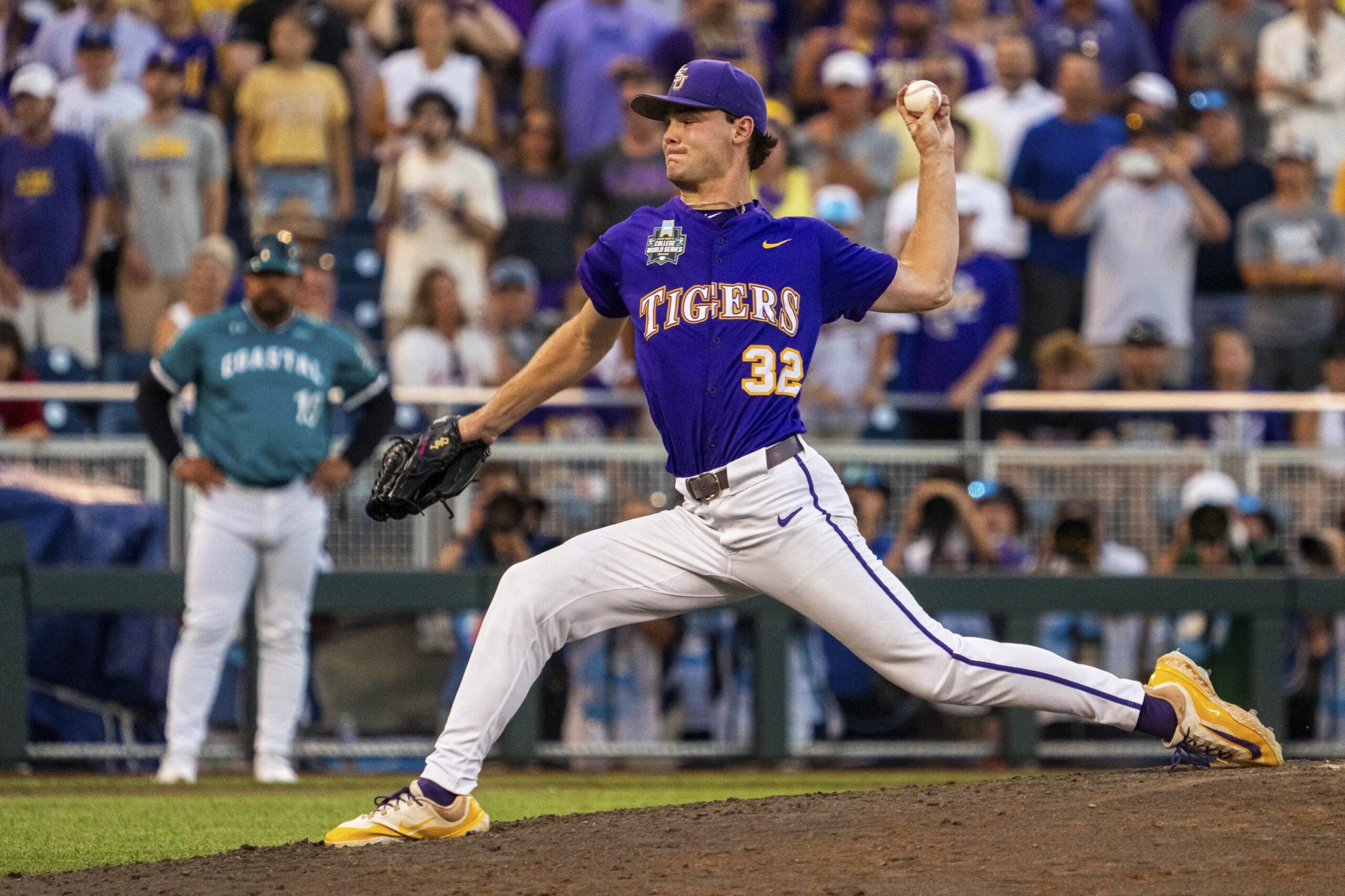Jun 21, 2025; Omaha, Neb, USA; LSU Tigers starting pitcher Kade Anderson (32) pitches against the Coastal Carolina Chanticleers during the ninth inning at Charles Schwab Field. Mandatory Credit: Dylan Widger-Imagn Images