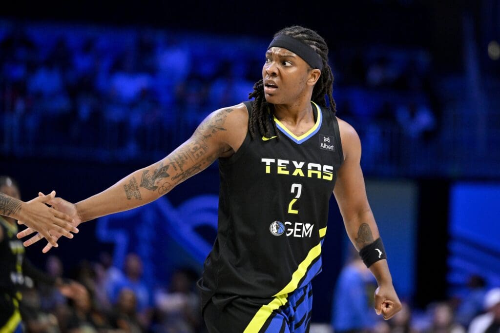 Jun 28, 2025; Arlington, Texas, USA; Dallas Wings forward Myisha Hines-Allen (2) celebrates with her team during the second half against the Washington Mystics at College Park Center. Mandatory Credit: Jerome Miron-Imagn Images
