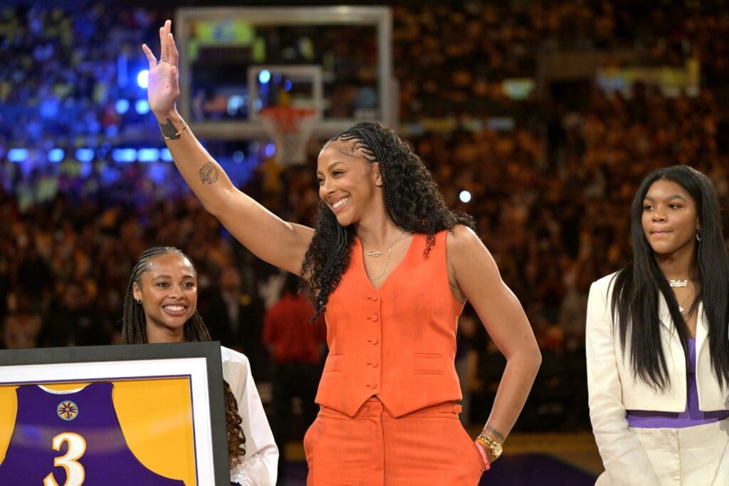 Jun 29, 2025; Los Angeles, California, USA; Former Los Angeles Sparks Candace Parker acknowledges the crowd during a jersey retirement ceremony at halftime at Crypto.com Arena. Mandatory Credit: Jayne Kamin-Oncea-Imagn Images