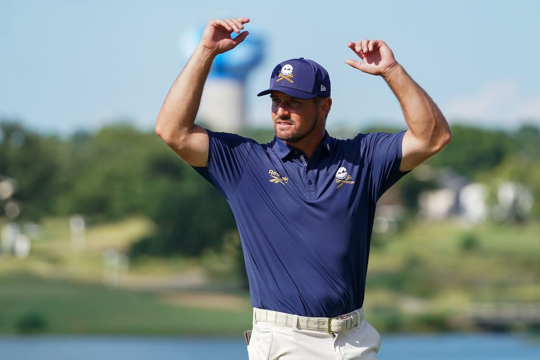 Jun 29, 2025; Carrollton, Texas, USA; Bryson DeChambeau tries to fire up the gallery prior to a four-man playoff during the final round of the LIV Golf Dallas golf tournament at Maridoe Golf Club. Mandatory Credit: Raymond Carlin III-Imagn Images