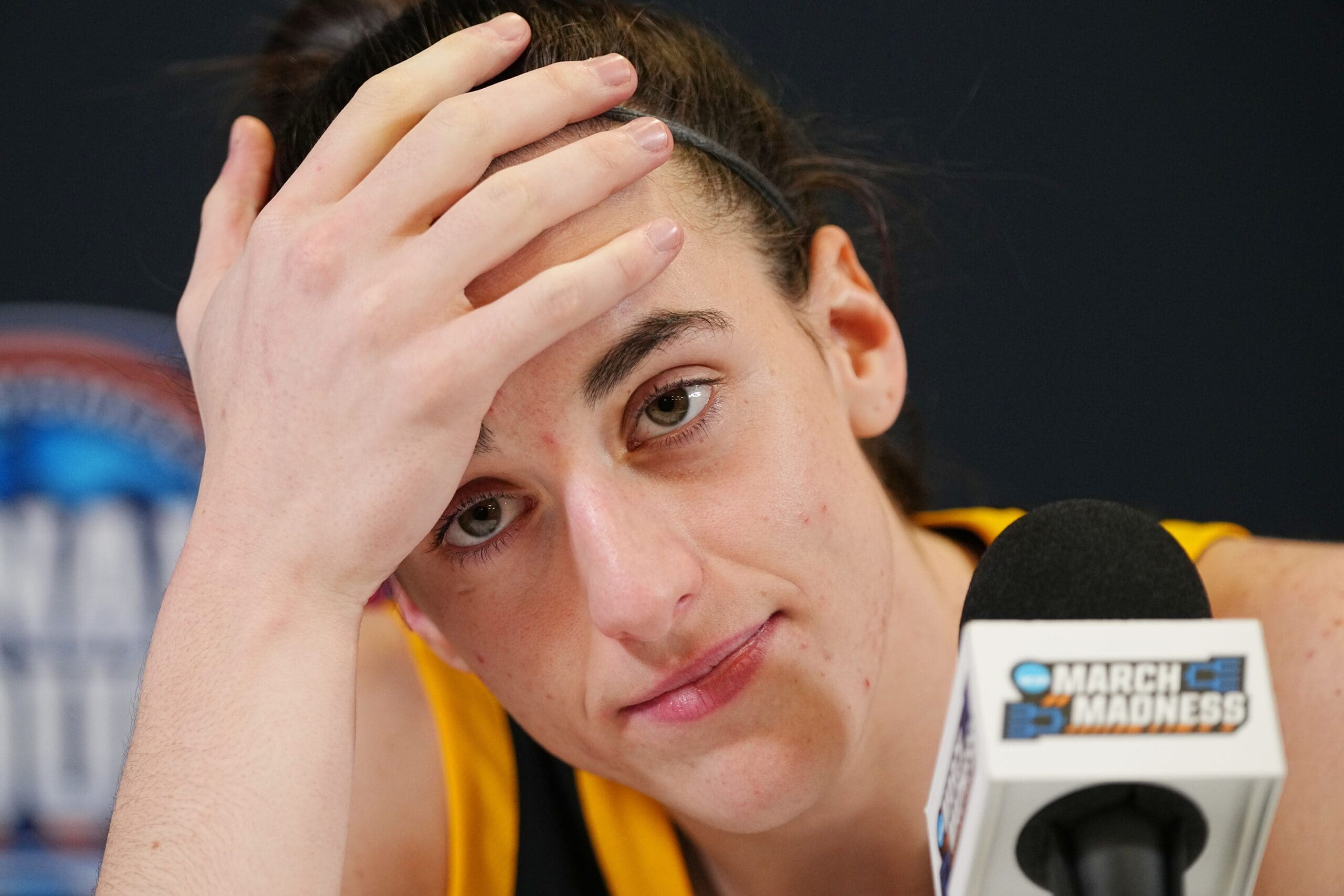 Iowa Hawkeyes guard Caitlin Clark (22) takes questions after the NCAA Tournament championship basketball game at Rocket Mortgage Fieldhouse, Sunday, April 7, 2024 in Cleveland.