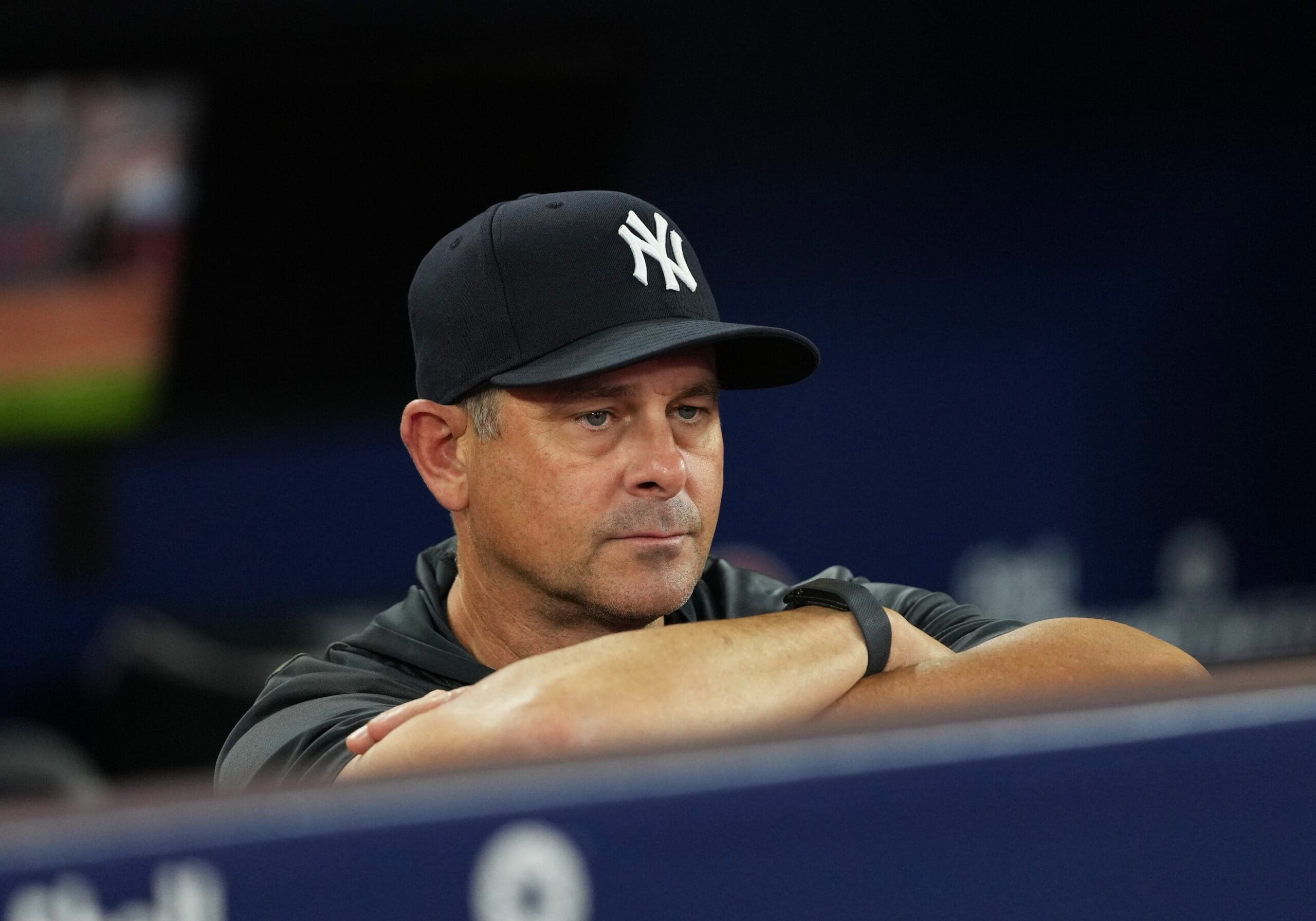 Jul 1, 2025; Toronto, Ontario, CAN; New York Yankees manager Aaron Boone (17) watches batting practice before a game against the Toronto Blue Jays at Rogers Centre. Mandatory Credit: Nick Turchiaro-Imagn Images