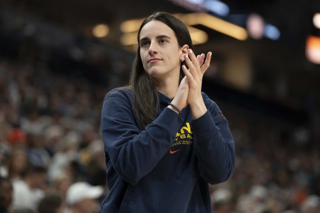 Jul 1, 2025; Minneapolis, Minnesota, USA; Indiana Fever guard Caitlin Clark (22) looks on against the Minnesota Lynx in the second half during the Commissioner's Cup final at Target Center. Mandatory Credit: Jesse Johnson-Imagn Images