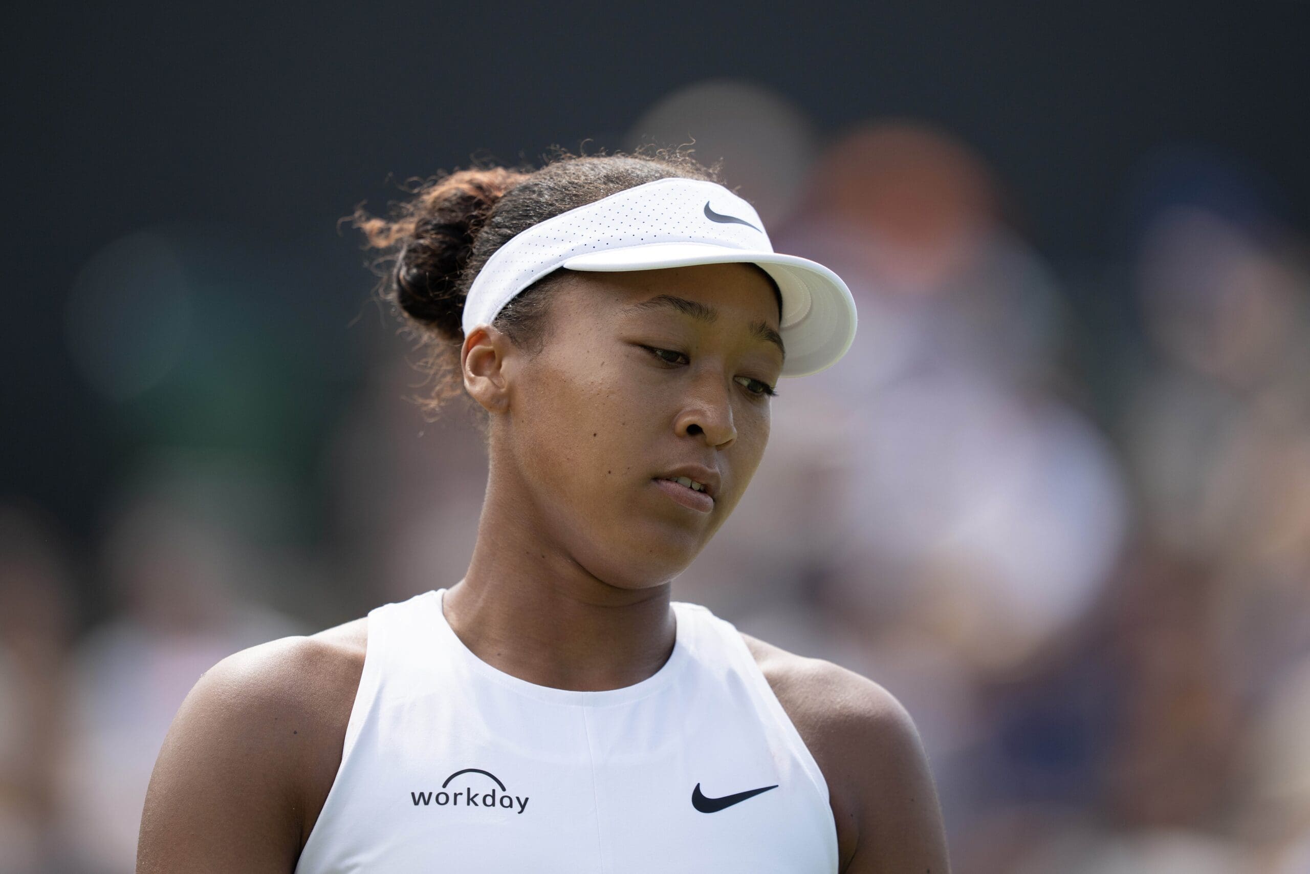 Jul 4, 2025; Wimbledon, United Kingdom; Naomi Osaka of Japan during her match against Anastasia Pavlyuchenkova on day five at the All England Lawn Tennis and Croquet Club. Mandatory Credit: Susan Mullane-Imagn Images