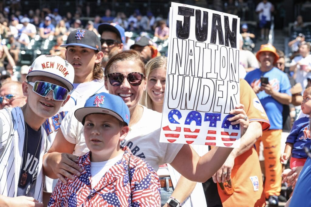 Jul 4, 2025; New York City, New York, USA; Fans hold a sign for New York Mets right fielder Juan Soto prior to the game against the New York Yankees at Citi Field. Mandatory Credit: Wendell Cruz-Imagn Images