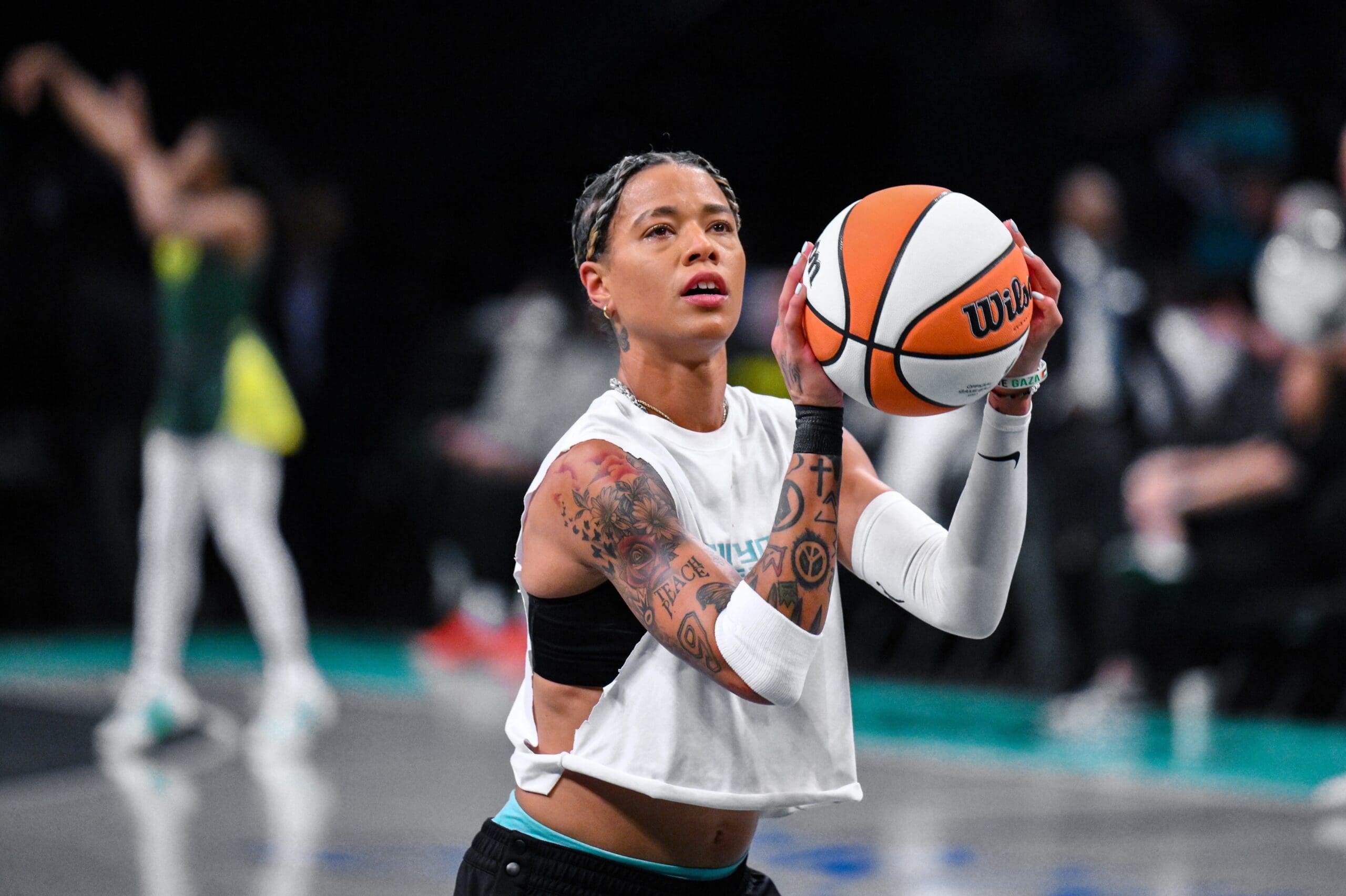 Jul 6, 2025; Brooklyn, New York, USA; New York Liberty guard Natasha Cloud (9) warms up before a game against the Seattle Storm at Barclays Center. Mandatory Credit: John Jones-Imagn Images