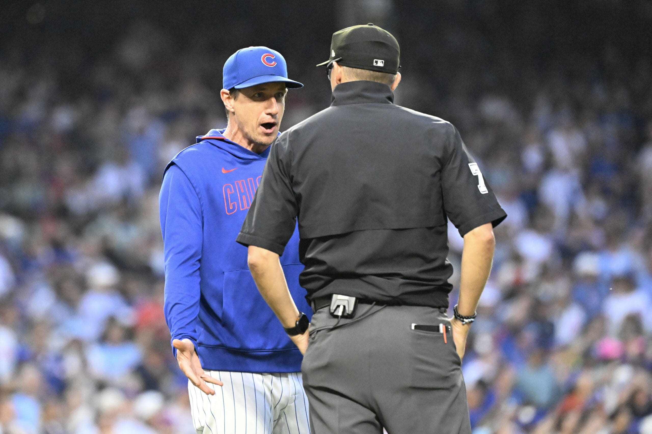 Jul 6, 2025; Chicago, Illinois, USA; Chicago Cubs manager Craig Counsell (11) argues a call with umpire Adam Hamari (78) during the third inning against the St. Louis Cardinals at Wrigley Field. Mandatory Credit: Matt Marton-Imagn Images