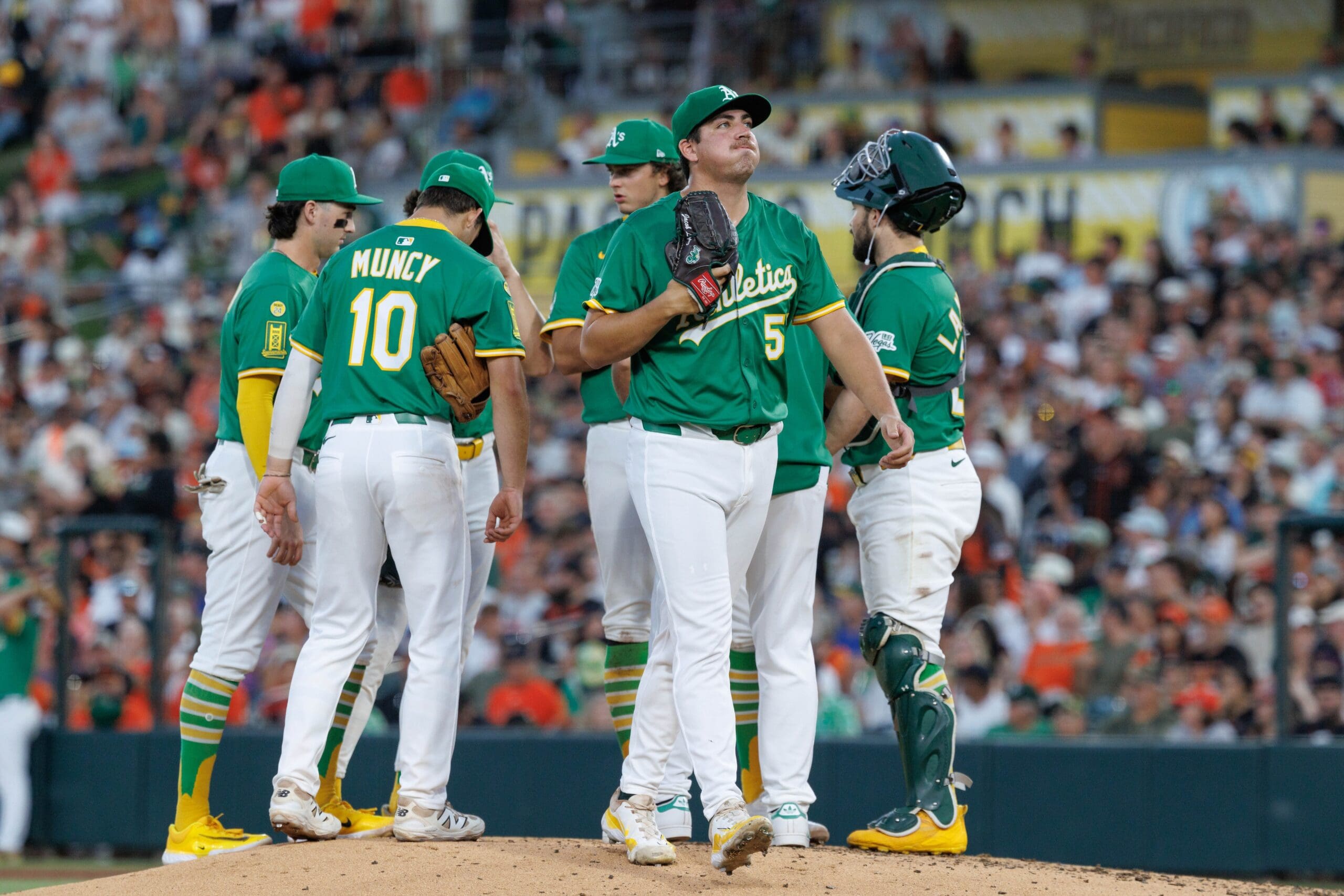 Jul 6, 2025; West Sacramento, California, USA; Athletics starting pitcher Jacob Lopez (57) is removed from the game during the fifth inning against the San Francisco Giants at Sutter Health Park. Mandatory Credit: Sergio Estrada-Imagn Images