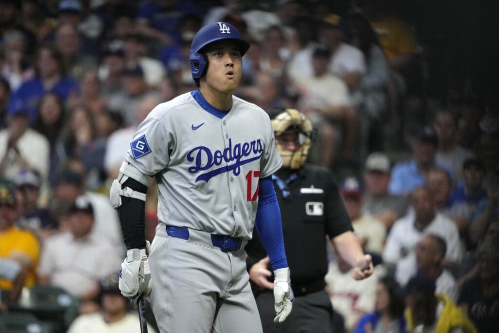 Jul 7, 2025; Milwaukee, Wisconsin, USA; Los Angeles Dodgers two-way player Shohei Ohtani (17) walks away from the batter’s box after being called out on strikes against the Milwaukee Brewers in the sixth inning.at American Family Field. Mandatory Credit: Michael McLoone-Imagn Images