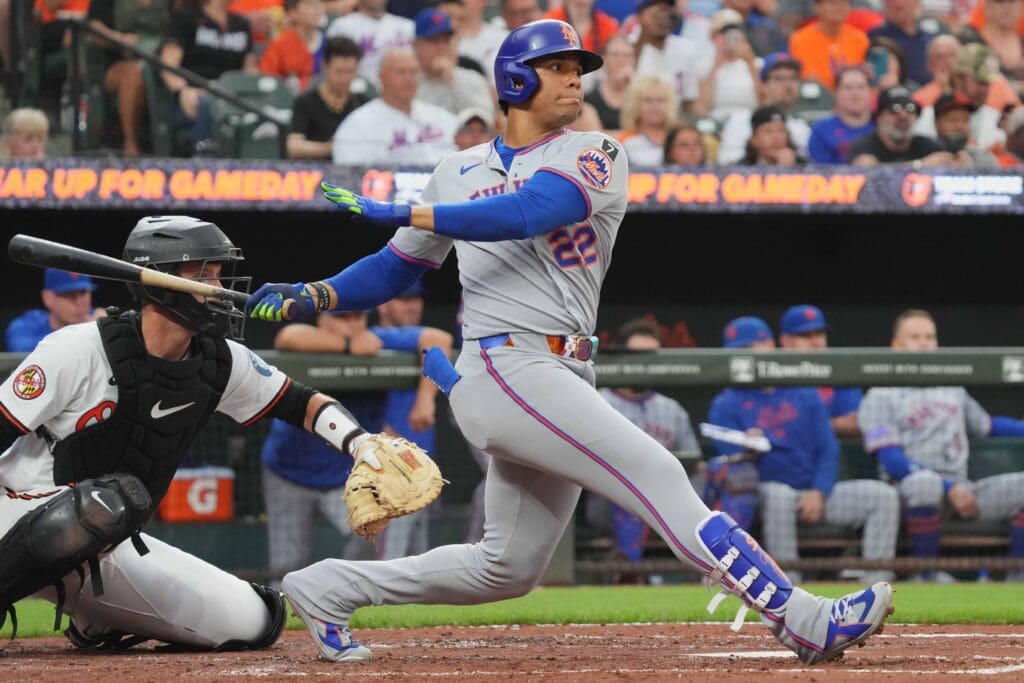 Jul 8, 2025; Baltimore, Maryland, USA; New York Mets outfielder Juan Soto (22) connects on a single during the fourth inning against the Baltimore Orioles at Oriole Park at Camden Yards. Mandatory Credit: Mitch Stringer-Imagn Images