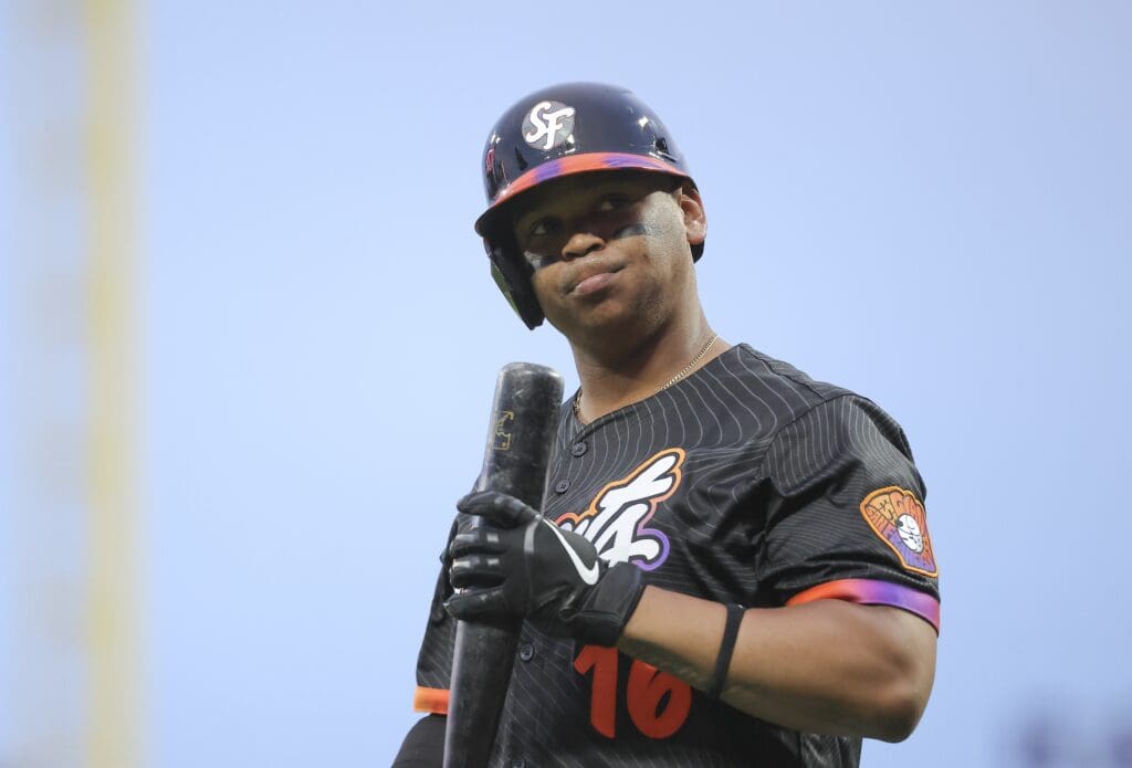 Jul 8, 2025; San Francisco, California, USA; San Francisco Giants designated hitter Rafael Devers (16) reacts after striking out to end the fifth inning leaving a runner on third base against the Philadelphia Phillies at Oracle Park. Mandatory Credit: Kelley L Cox-Imagn Images