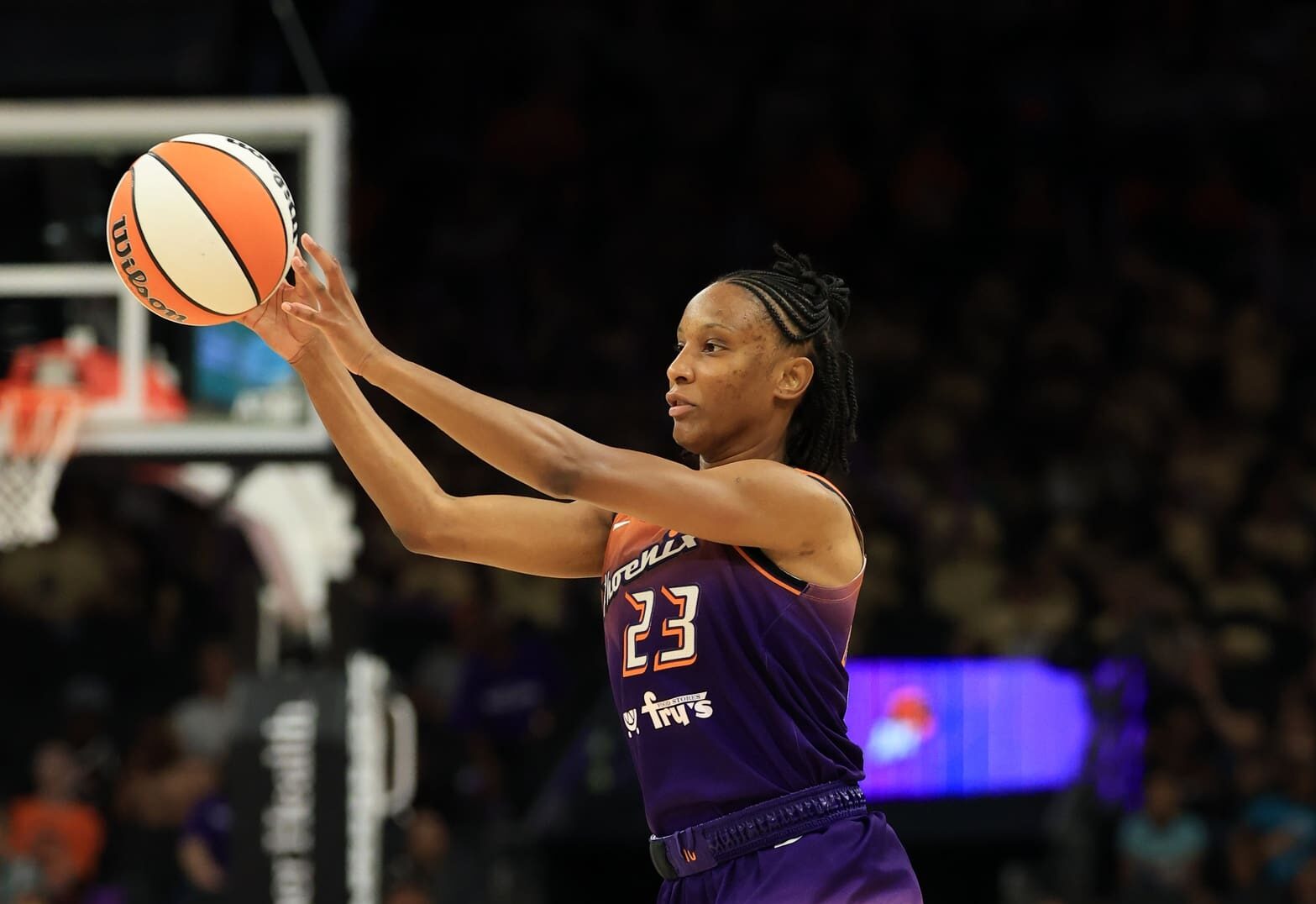 Jul 9, 2025; Phoenix, Arizona, USA; Phoenix Mercury guard Kiana Williams (23) against the Minnesota Lynx during the first half at PHX Arena. Mandatory Credit: Mark J. Rebilas-Imagn Images