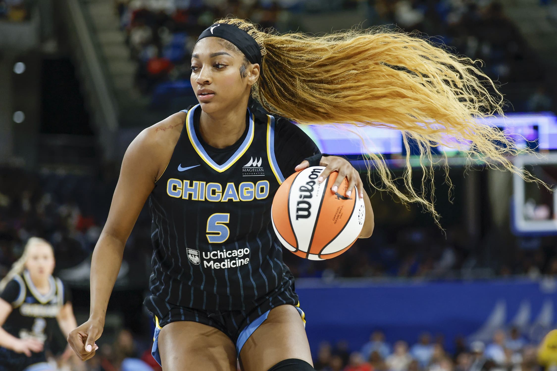 Jul 9, 2025; Chicago, Illinois, USA; Chicago Sky forward Angel Reese (5) drives to the basket against the Dallas Wings during the second half of a WNBA game at Wintrust Arena. Mandatory Credit: Kamil Krzaczynski-Imagn Images