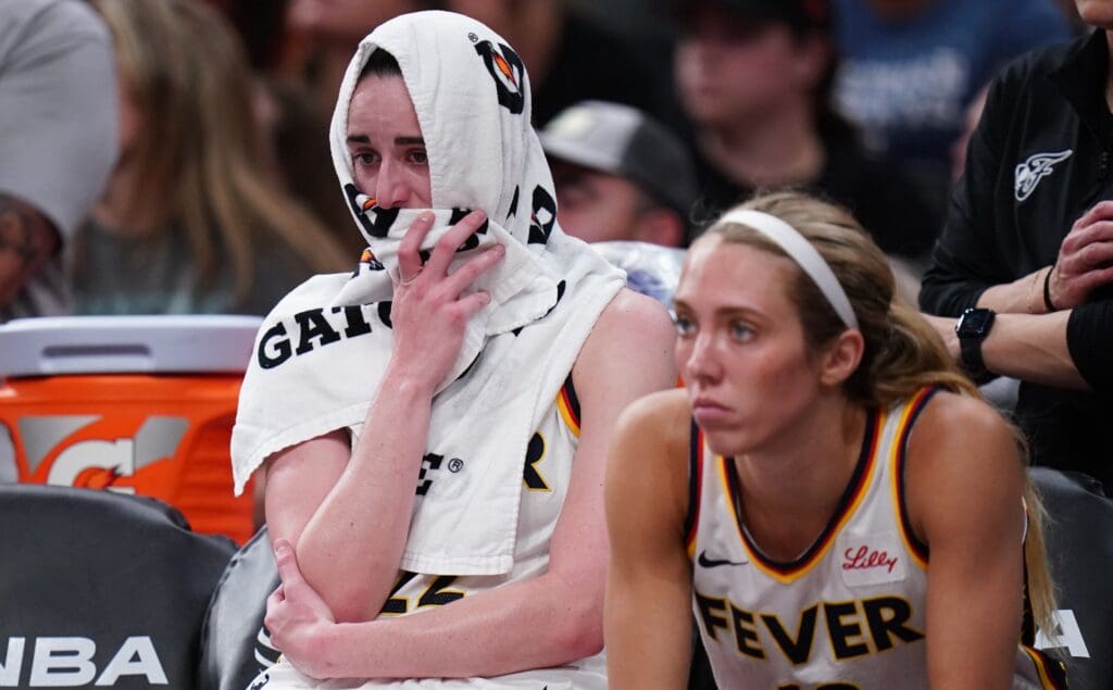 Jul 15, 2025; Boston, Massachusetts, USA; Indiana Fever guard Caitlin Clark (22) reacts on the bench after a play in the final second of the game against the Connecticut Sun at TD Garden. Mandatory Credit: David Butler II-Imagn Images