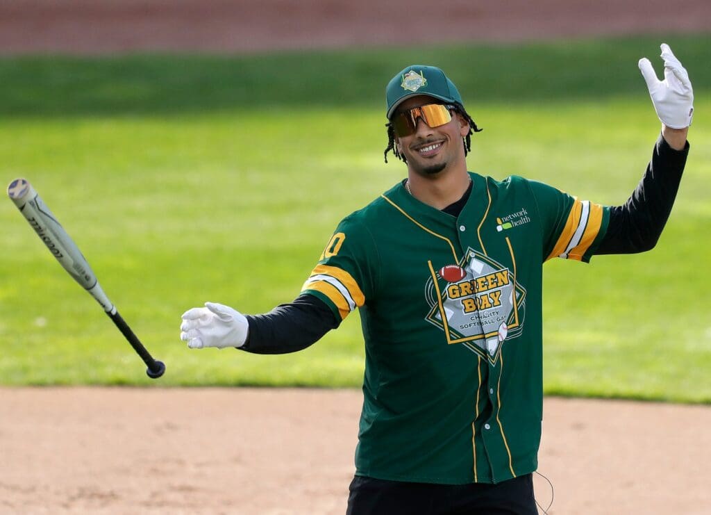 Jordan Love (10) reacts after winning then home run derby during the Green Bay Charity Softball Game on Friday, May 10, 2024, at Neuroscience Group Field at Fox Cities Stadium in Grand Chute, Wm. Glasheen USA TODAY NETWORK-Wisconsin