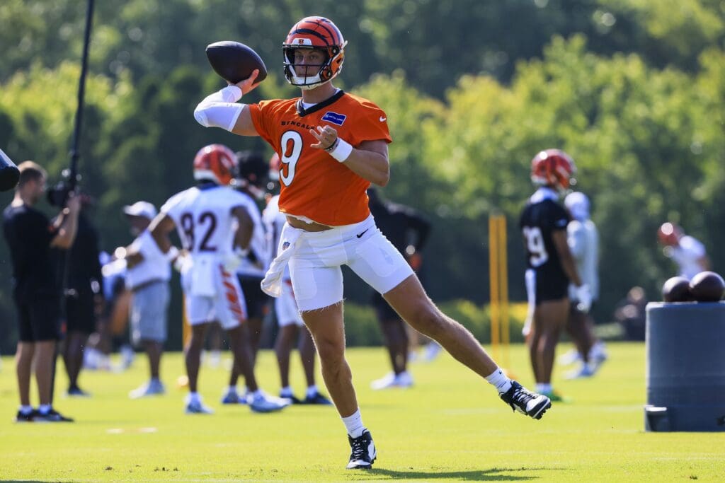 Jul 23, 2025; Cincinnati, OH, USA; Cincinnati Bengals quarterback Joe Burrow (9) throws a pass during training camp at Kettering Health Practice Field. Mandatory Credit: Katie Stratman-Imagn Images