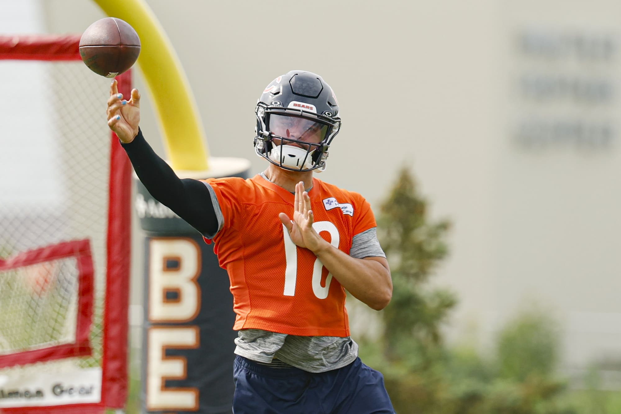 Jul 24, 2025; Lake Forest, IL, USA; Chicago Bears quarterback Caleb Williams (18) passes the ball during training camp at Halas Hall. Mandatory Credit: Kamil Krzaczynski-Imagn Images