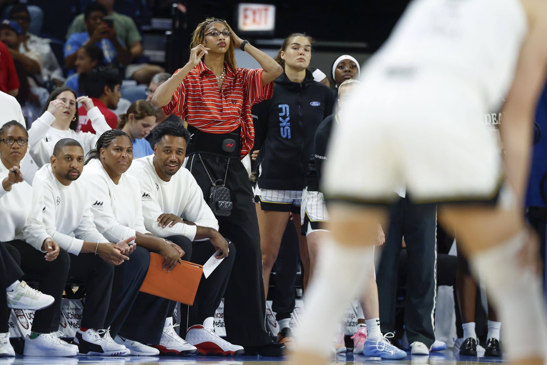 Jul 24, 2025; Chicago, Illinois, USA; Injured Chicago Sky forward Angel Reese (5) watches from the bench during the first half of a basketball game against Seattle Storm at Wintrust Arena. Mandatory Credit: Kamil Krzaczynski-Imagn Images