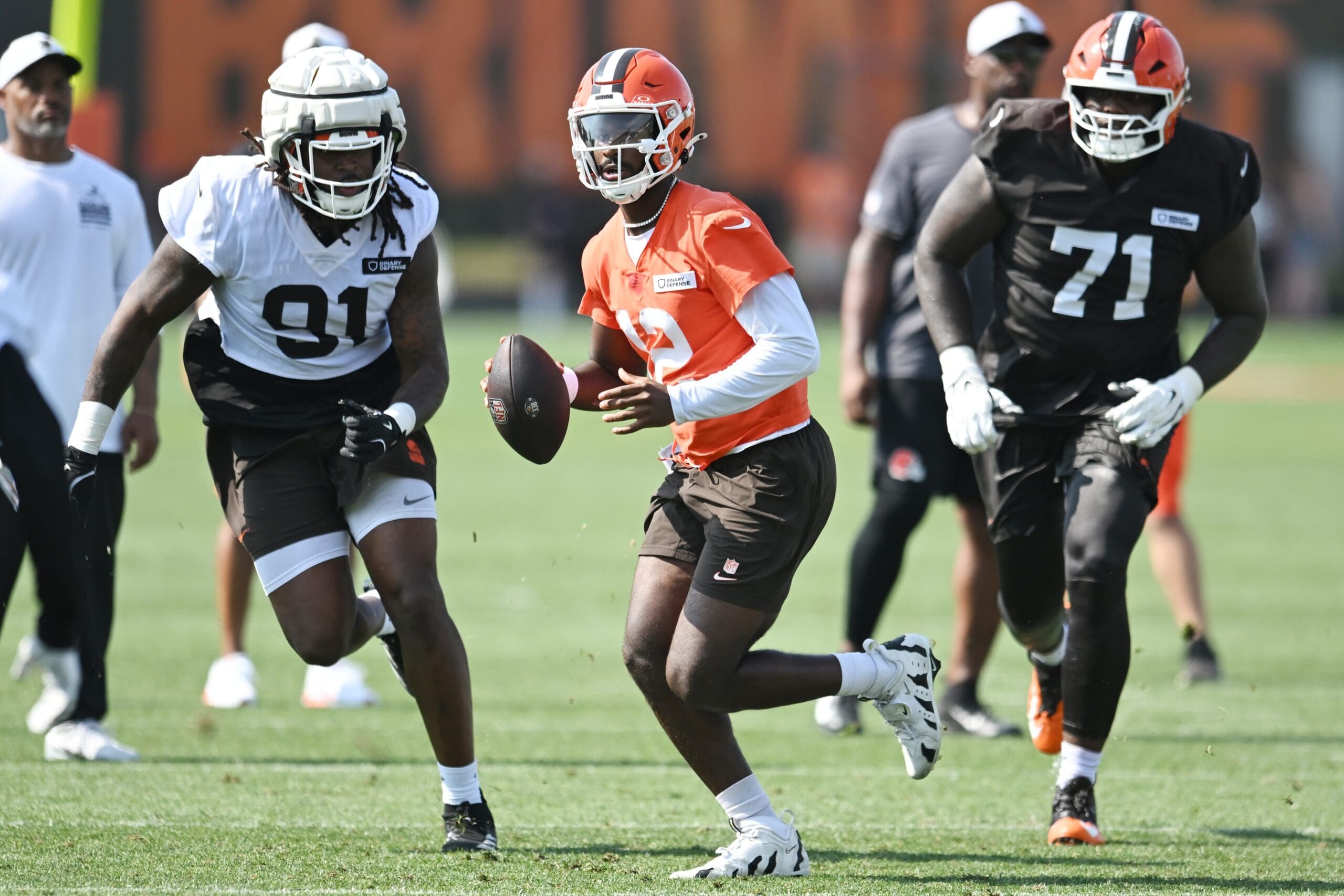 Jul 26, 2025; Berea, OH, USA; Cleveland Browns quarterback Shedeur Sanders (12) scrambles during training camp at CrossCountry Mortgage Campus. Mandatory Credit: Ken Blaze-Imagn Images