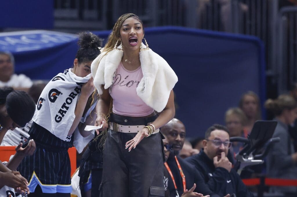 Jul 27, 2025; Chicago, Illinois, USA; Injured Chicago Sky forward Angel Reese (5) reacts from the bench during the first half of a basketball game against the Indiana Fever at United Center. Mandatory Credit: Kamil Krzaczynski-Imagn Images