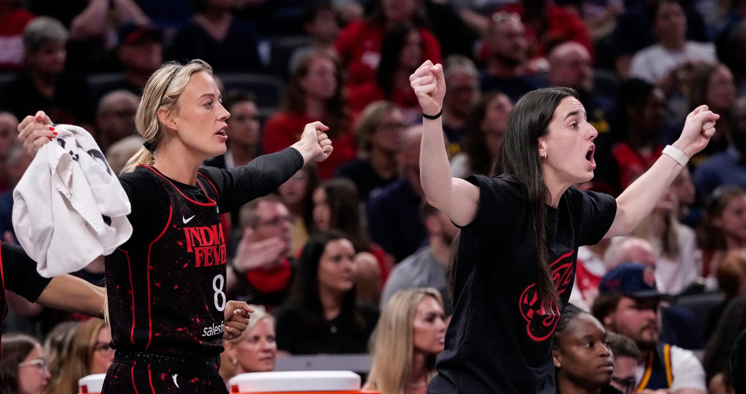 Indiana Fever guard Sophie Cunningham (8) reacts to a call from he referee with Indiana Fever guard Caitlin Clark (22) on Wednesday, July 30, 2025, during the game at Gainbridge Fieldhouse in Indianapolis. The Indiana Fever defeated the Phoenix Mercury, 107-101.