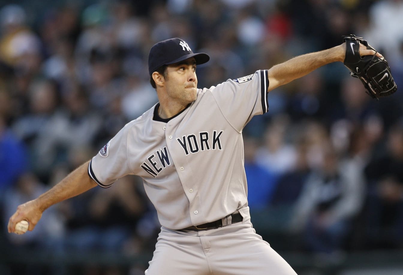 Apr 23, 2008; Chicago, IL, USA; New York Yankees starting pitcher Mike Mussina (35) delivers a pitch during the first inning against the Chicago White Sox at US Cellular Field. The Yankees beat the White Sox 6-4. Mandatory Credit: Apr 23, 2008; Chicago, IL, USA; New York Yankees starting pitcher Mike Mussina (35) delivers a pitch during the first inning against the Chicago White Sox at US Cellular Field. The Yankees beat the White Sox 6-4. Mandatory Credit: Jerry Lai-USA TODAY Sports