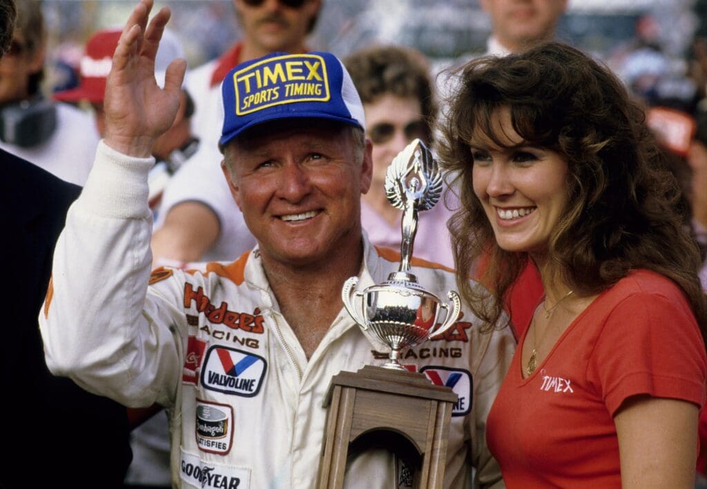 Feb 19, 1984; Daytona Bch, FL, USA FILE PHOTO; NASCAR Winston Cup driver Cale Yarborough celebrates in victory lane after winning the Daytona 500 at the Daytona International Speedway. Mandatory Credit: Manny Rubio-USA TODAY Sports