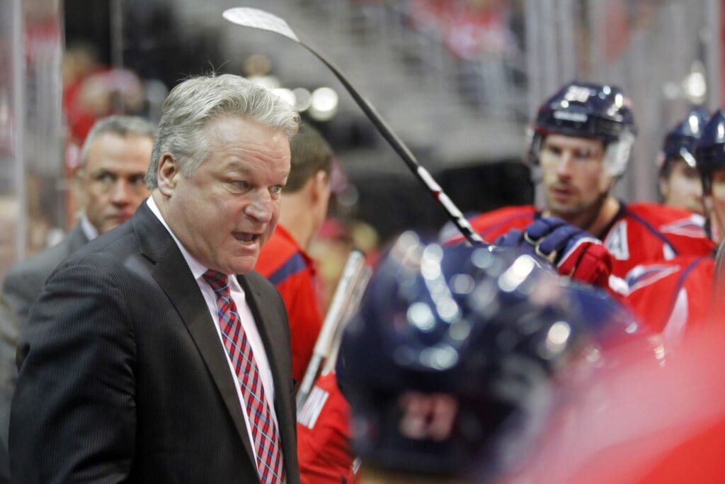 March 6, 2012; Washington, DC, USA; Washington Capitals head coach Dale Hunter yells at his team on the bench during a timeout against the Carolina Hurricanes in the second period at Verizon Center. The Hurricanes won 4-3 in overtime. Mandatory Credit: Geoff Burke-USA TODAY Sports