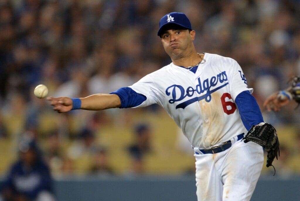 Aug 14, 2013; Los Angeles, CA, USA;    Los Angeles Dodgers third baseman Jerry Hairston Jr. (6) makes an out in the eighth inning of the game against the New York Mets at Dodger Stadium. Mandatory Credit: Jayne Kamin-Oncea-USA TODAY Sports