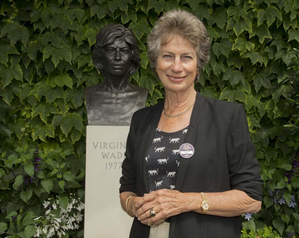 Jun 28, 2014; London, United Kingdom; Virginia Wade poses for a photo in front of her bust after being presented with her International Tennis Hall of Fame ring on day six of the 2014 Wimbledon Championships at the All England Lawn and Tennis Club. Mandatory Credit: Susan Mullane-USA TODAY Sports