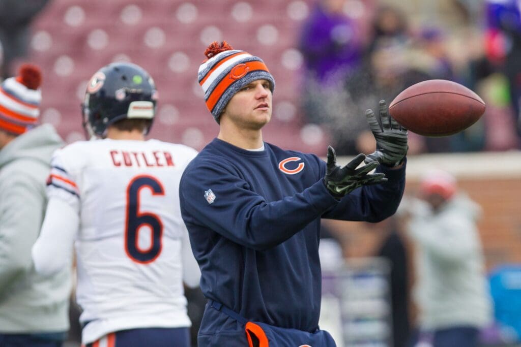 Dec 28, 2014; Minneapolis, MN, USA; Chicago Bears quarterback Jimmy Clausen (8) catches a football against the Minnesota Vikings at TCF Bank Stadium. The Minnesota Vikings win 13-9. Mandatory Credit: Brad Rempel-USA TODAY Sports
