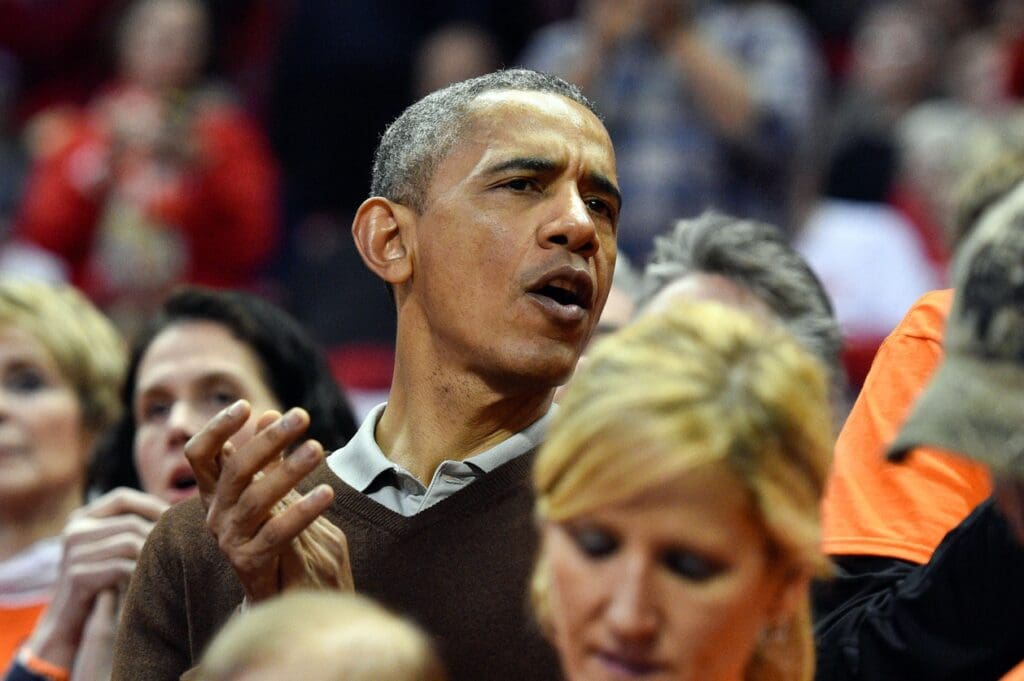 Mar 21, 2015; College Park, MD, USA; The President of the United States, Barack Obama looks on before a game between the Princeton Tigers and the Green Bay Phoenix during the first round of the women's NCAA Tournament at Xfinity Center. Mandatory Credit: Derik Hamilton-USA TODAY Sports