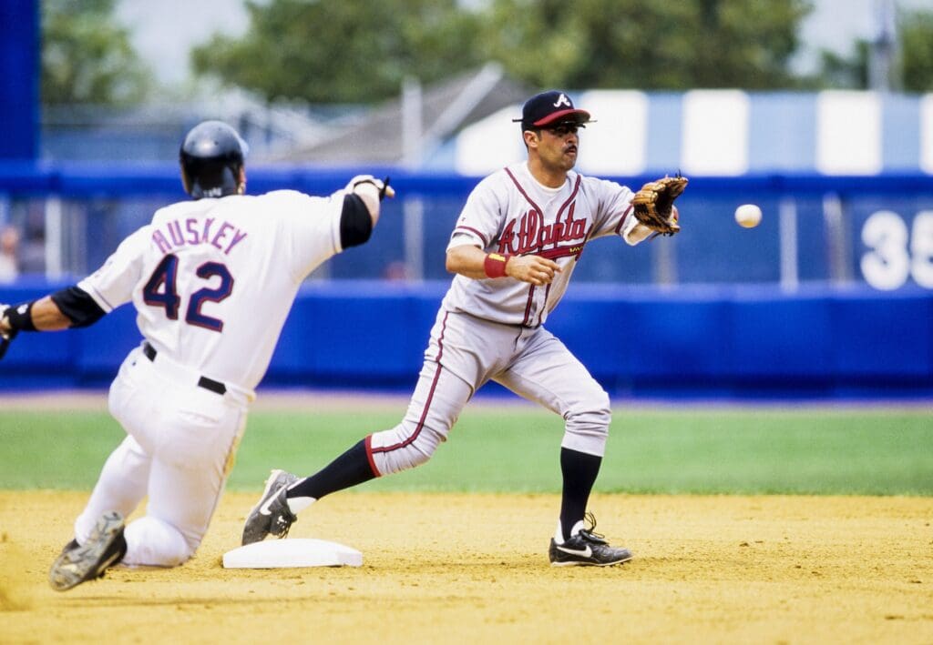 1998, Flushing, NY, USA; FILE PHOTO; Atlanta Braves infielder Ozzie Guillen in action against the New York Mets at Shea Stadium. Mandatory Credit: RVR Photos-USA TODAY Sports