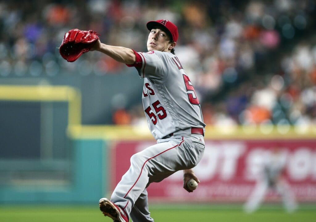 Jul 24, 2016; Houston, TX, USA; Los Angeles Angels starting pitcher Tim Lincecum (55) delivers a pitch during the second inning against the Houston Astros at Minute Maid Park. Mandatory Credit: Troy Taormina-USA TODAY Sports