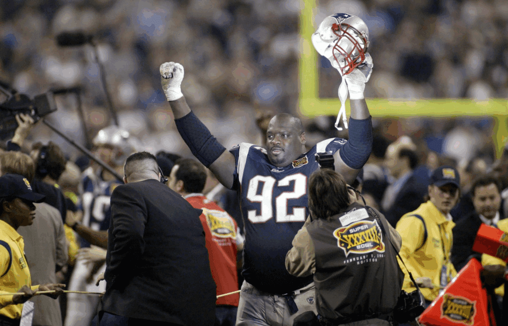 Feb 1, 2004; Houston, TX, USA; FILE PHOTO; New England Patriots defensive tackle Ted Washington (92) celebrates defeating the Carolina Panthers during Super Bowl XXXVIII at Reliant Stadium. The Patriots defeated the Panthers 32-29. Mandatory Credit: MPS-Imagn Images