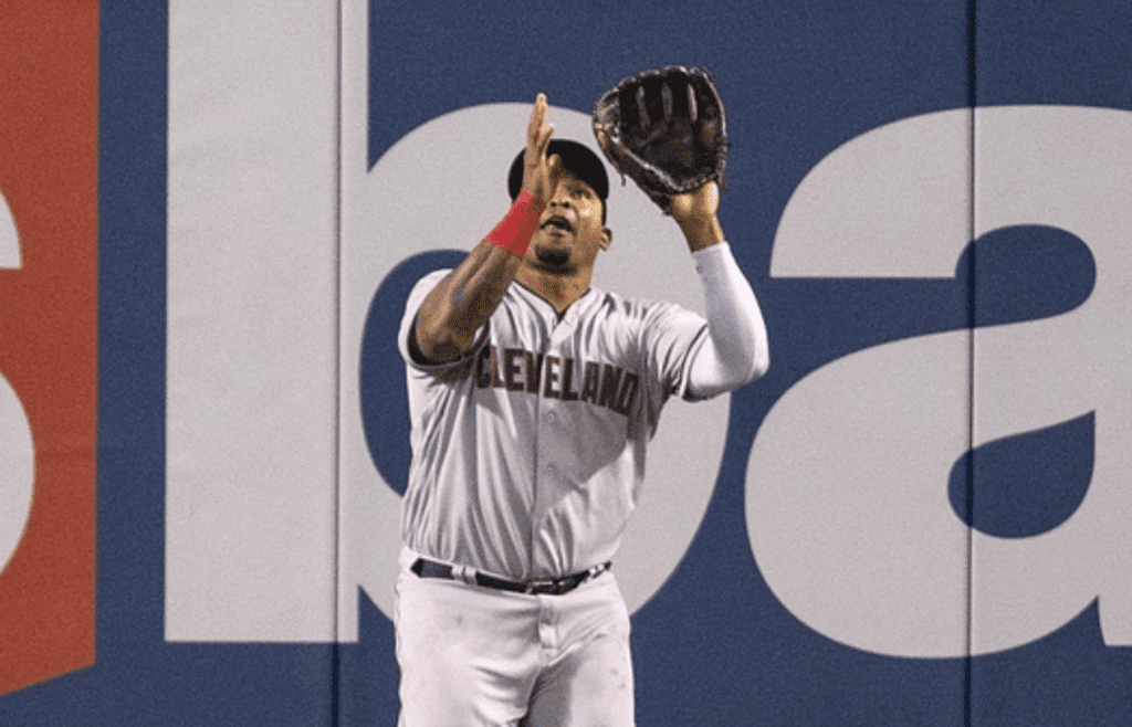 Apr 27, 2016; Minneapolis, MN, USA; Cleveland Indians right fielder Marlon Byrd (6) catches a fly ball in the fourth inning against the Minnesota Twins at Target Field. Mandatory Credit: Jesse Johnson-Imagn Images