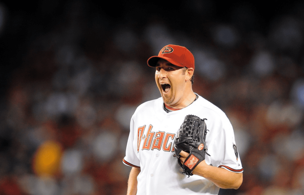 Apr. 6, 2009; Phoenix, AZ, USA; Arizona Diamondbacks pitcher Brandon Webb reacts against the Colorado Rockies during opening day 2009 at Chase Field. Mandatory Credit: Mark J. Rebilas-Imagn Images