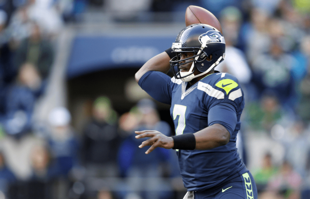 Sep 22, 2013; Seattle, WA, USA; Seattle Seahawks quarterback Tarvaris Jackson (7) passes against the Jacksonville Jaguars during the fourth quarter at CenturyLink Field. Mandatory Credit: Joe Nicholson-Imagn Images