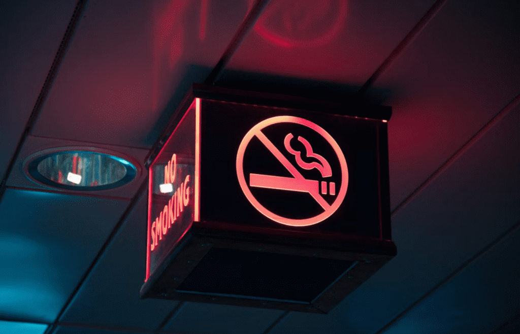 Sign indicating no smoking inside airport terminal