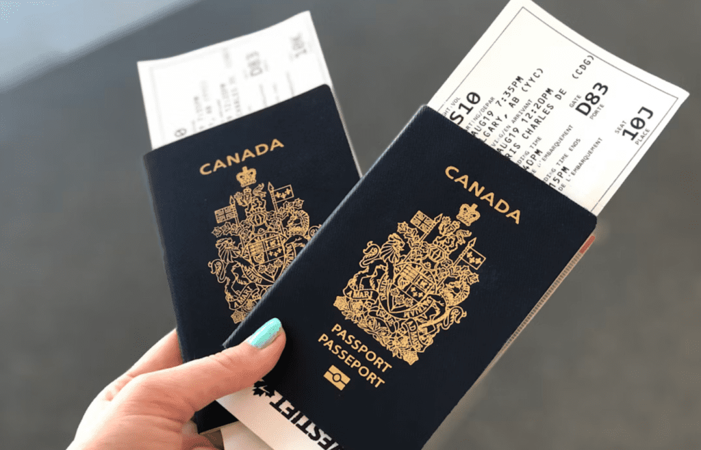 Woman holding old-fashioned paper travel tickets