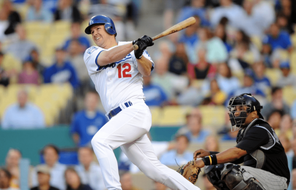 June 2, 2008; Los Angeles, CA, USA; Los Angeles Dodgers second baseman Jeff Kent (12) hits a home run in the first inning against the Colorado Rockies at Dodger Stadium. Mandatory Credit: Kirby Lee/Image of Sport-Imagn Images