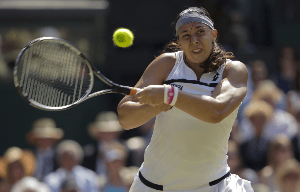 Jul 5, 2013; London, United Kingdom; Marion Bartoli (FRA) during her match against Sabine Lisicki (GER) (not pictured) on day 12 of the 2013 Wimbledon Championships at the All England Lawn Tennis Club. Mandatory Credit: Susan Mullane-Imagn Images