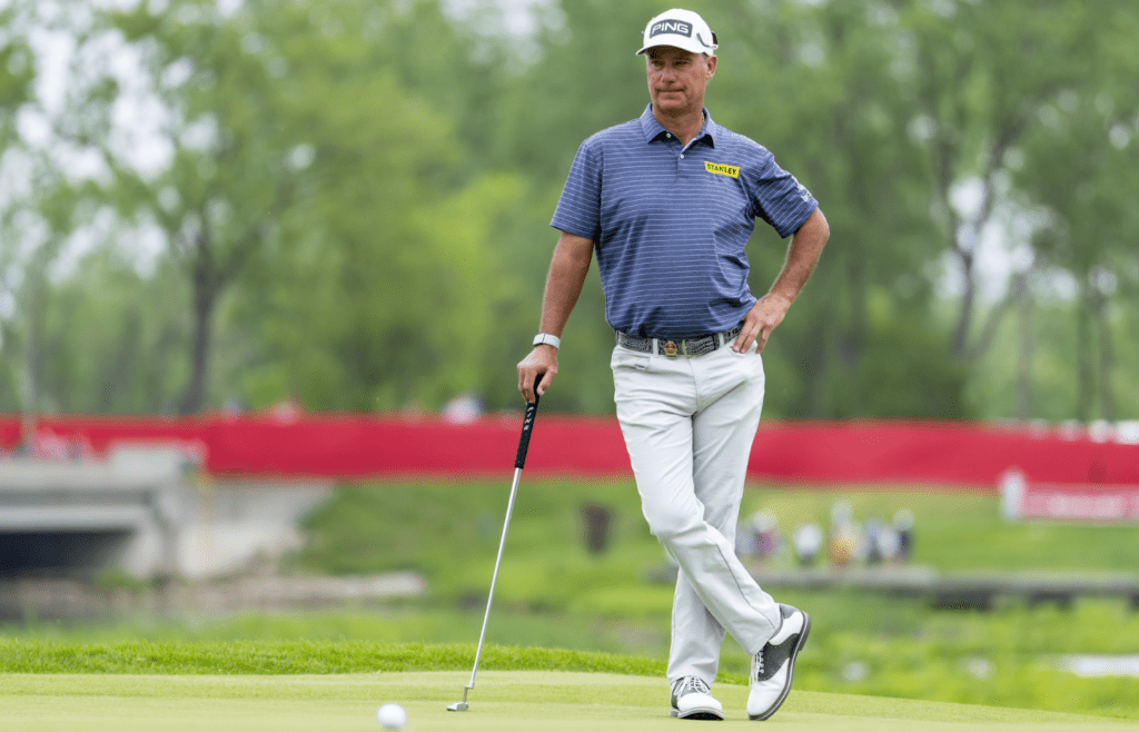 May 26, 2022; Benton Harbor, Michigan, USA; Chris Dimarco waits for his turn to putt on the eighteenth green during the first round of the 2022 KitchenAid Senior PGA Championship at Harbor Shores. Mandatory Credit: Raj Mehta-Imagn Images